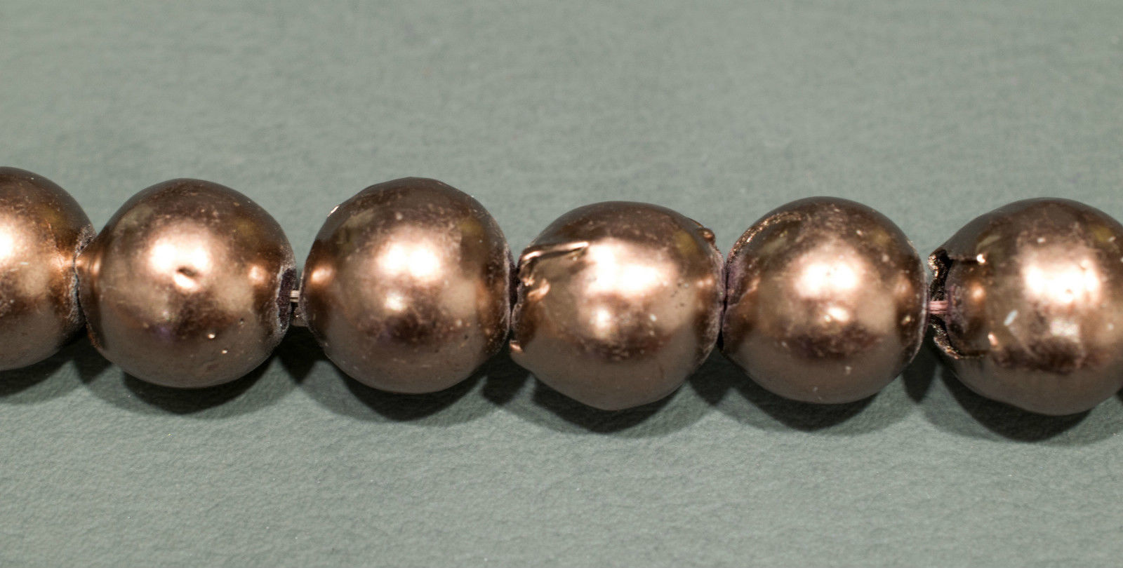 Perlenstrang Bronze rund mit hohem Lüster in 13 mm